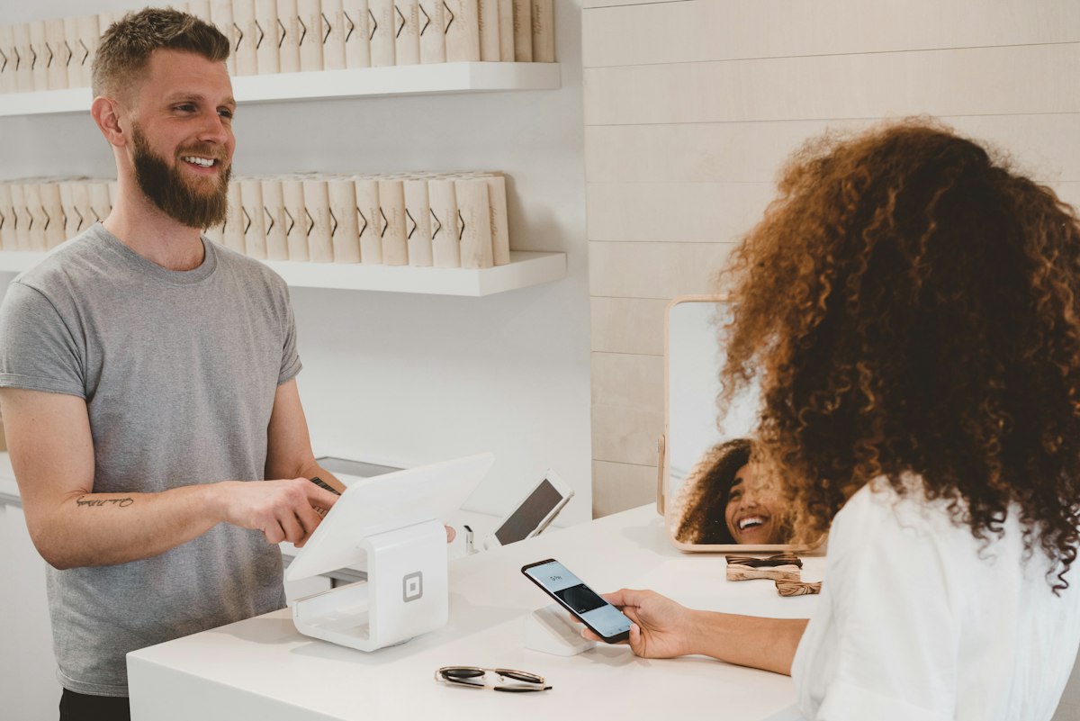 Client completing a fast, friendly transaction